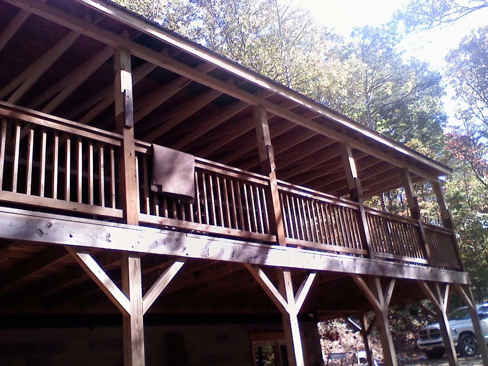 Timber framing under a new elevated porch and deck — Roof Leak Repair in South Fork by Roofing Brothers